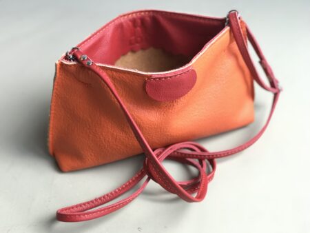 kniptasje PUK oranje/ rood accent